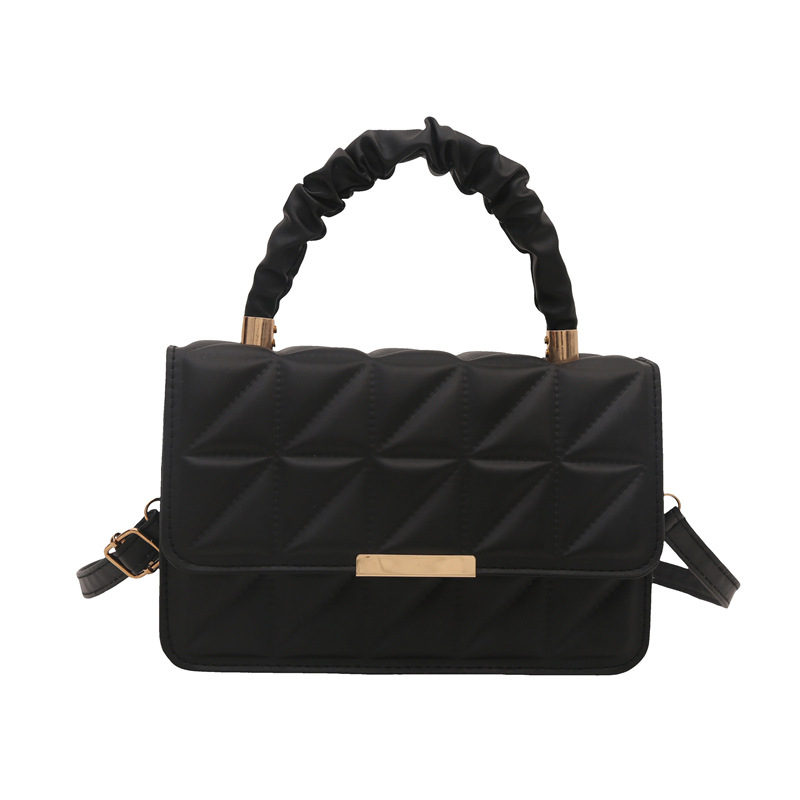 Minimalista bolso de viaje de viento 2024 engolpeado diamante otoño nuevo diseño de bolso de hombro simple estilo bolso de mochila