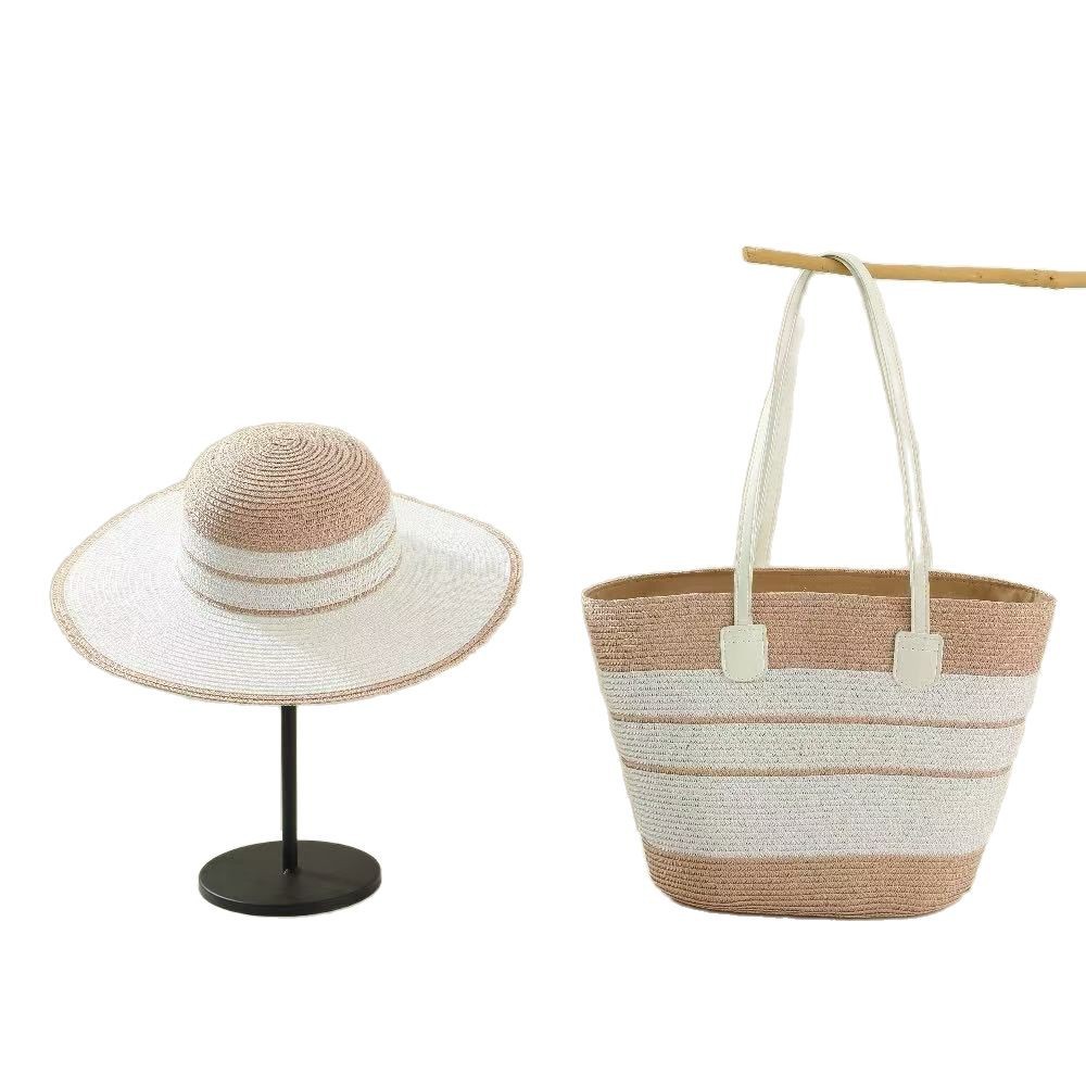 El nuevo bolso de sombrero de paja de verano tiene dos juegos de sombreros de sol de viaje al aire libre de alta gama de moda con bolsos de paja de temperamento.