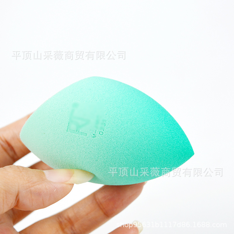 R某T美化粧卵超ソフトは粉を食べずに化粧パフを斜めに切ったスポンジ卵の化粧卵の輸出品質にわずかな欠陥がある|undefined