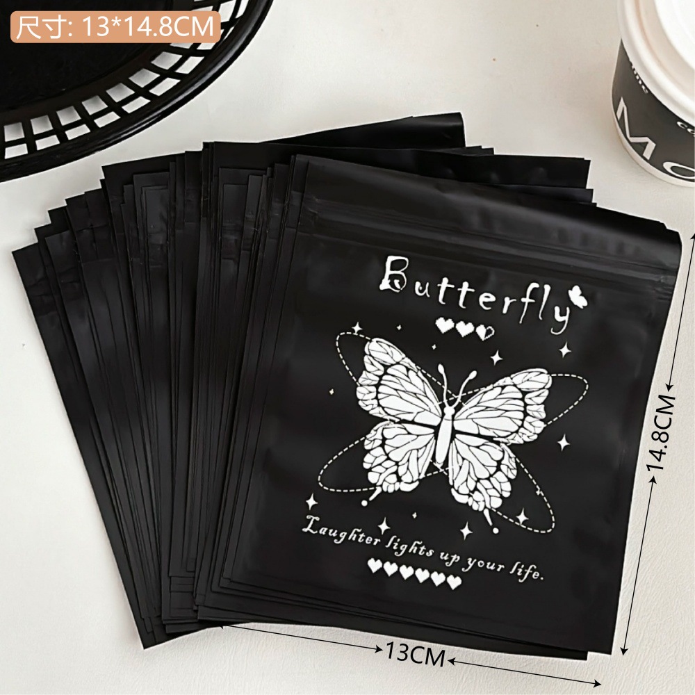 Bolsa de alto valor negro y blanco mariposa auto-sellada, pequeña bolsa de regalo, bolsa de embalaje de regalo, bolsa de sellado de viento, pequeña bolsa ciega