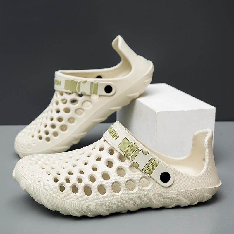 2025 verano transfronterizo nuevos zapatos con agujeros sandalias de playa para hombres Baotou hueca suela suave sandalias y zapatillas de exterior de gran tamaño