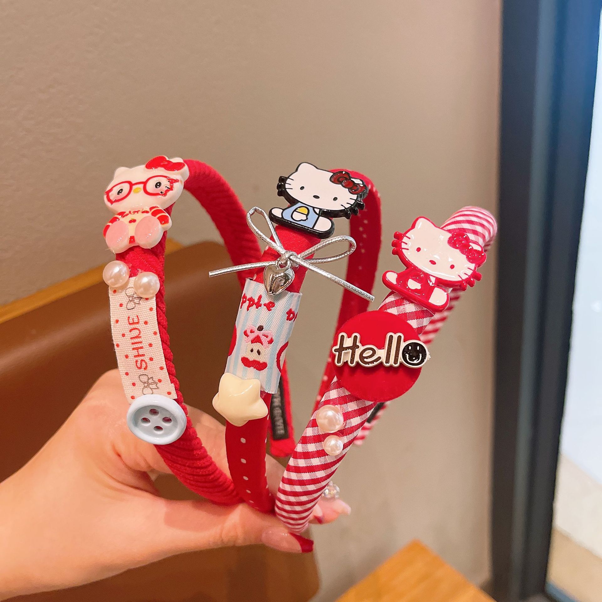 Nuevos niños al por mayor esponja banda de cabello de dibujos animados KT gato arco clip de cabello no estrangulación cabeza alta cráneo bebé joyería de cabello