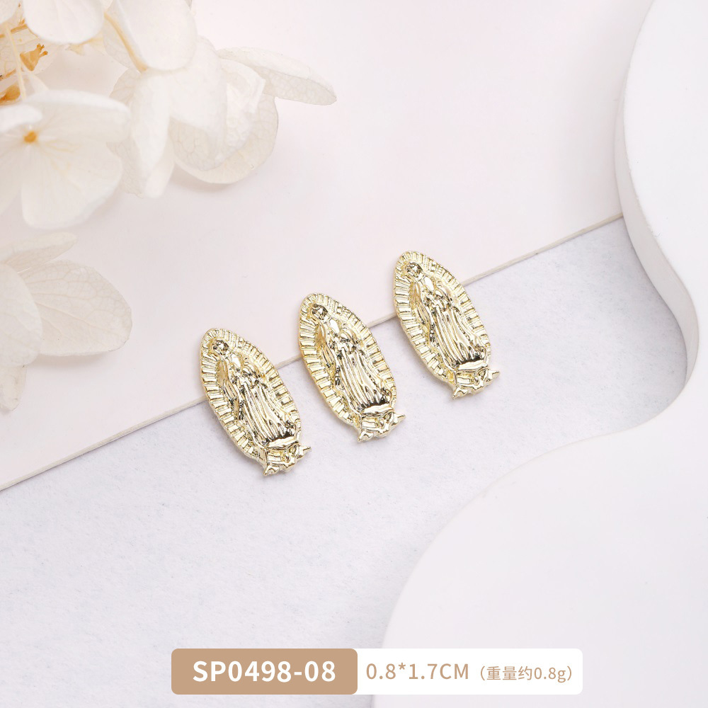 Arte de uñas transfronterizo Jesús accesorios de metal DIY vintage metal aleación uñas arte joyería europea y americana Luz de lujo accesorios con diamante