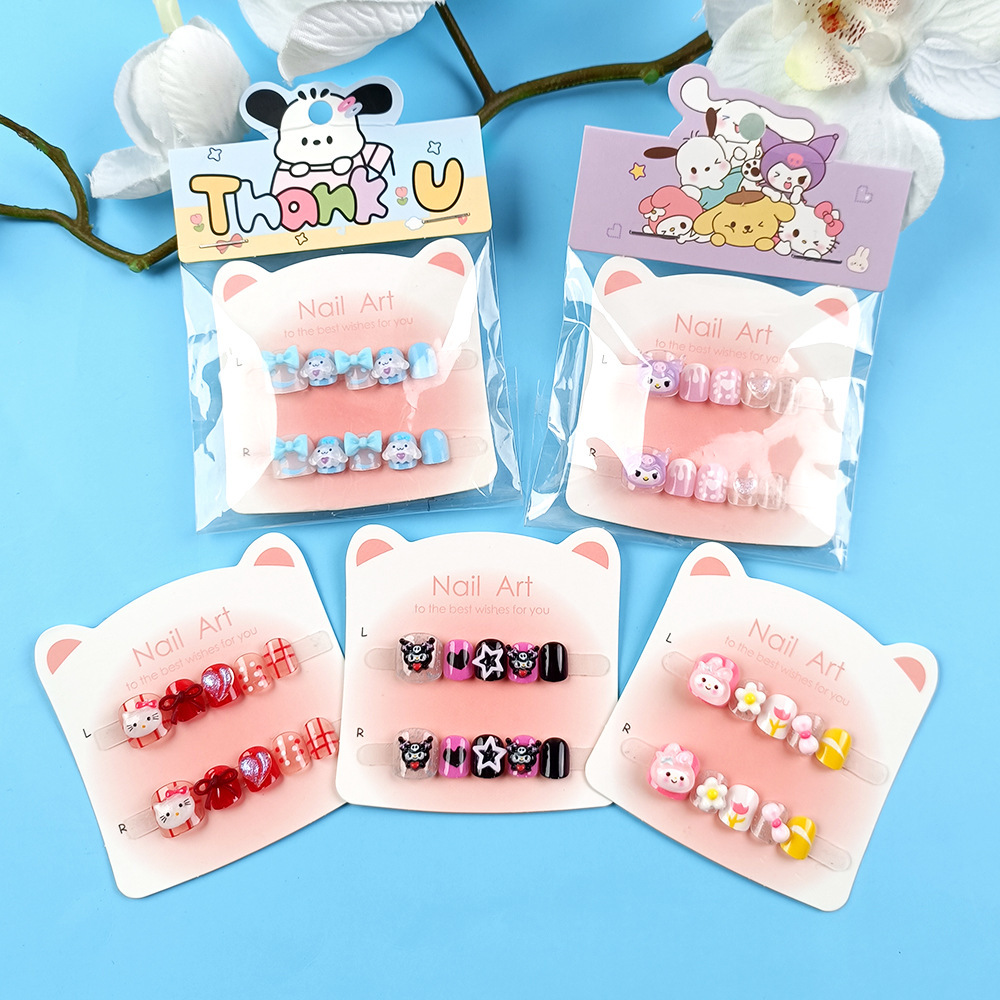 Punto de perforación diez piezas de papel de cartón de manicura gato arco de mariposa niños que usan uñas dibujos animados adorables parches de uñas para niños