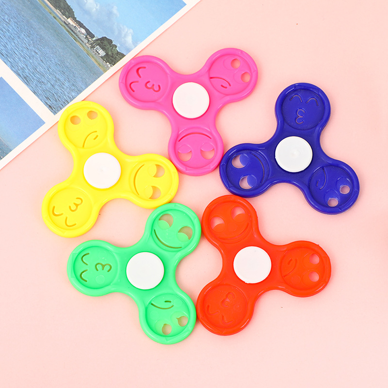 6,5 Smiley face bearing-free yema del dedo Gyro Dedo de tres hojas Spyro cross-border espiral dedo descompresión juguete al por mayor