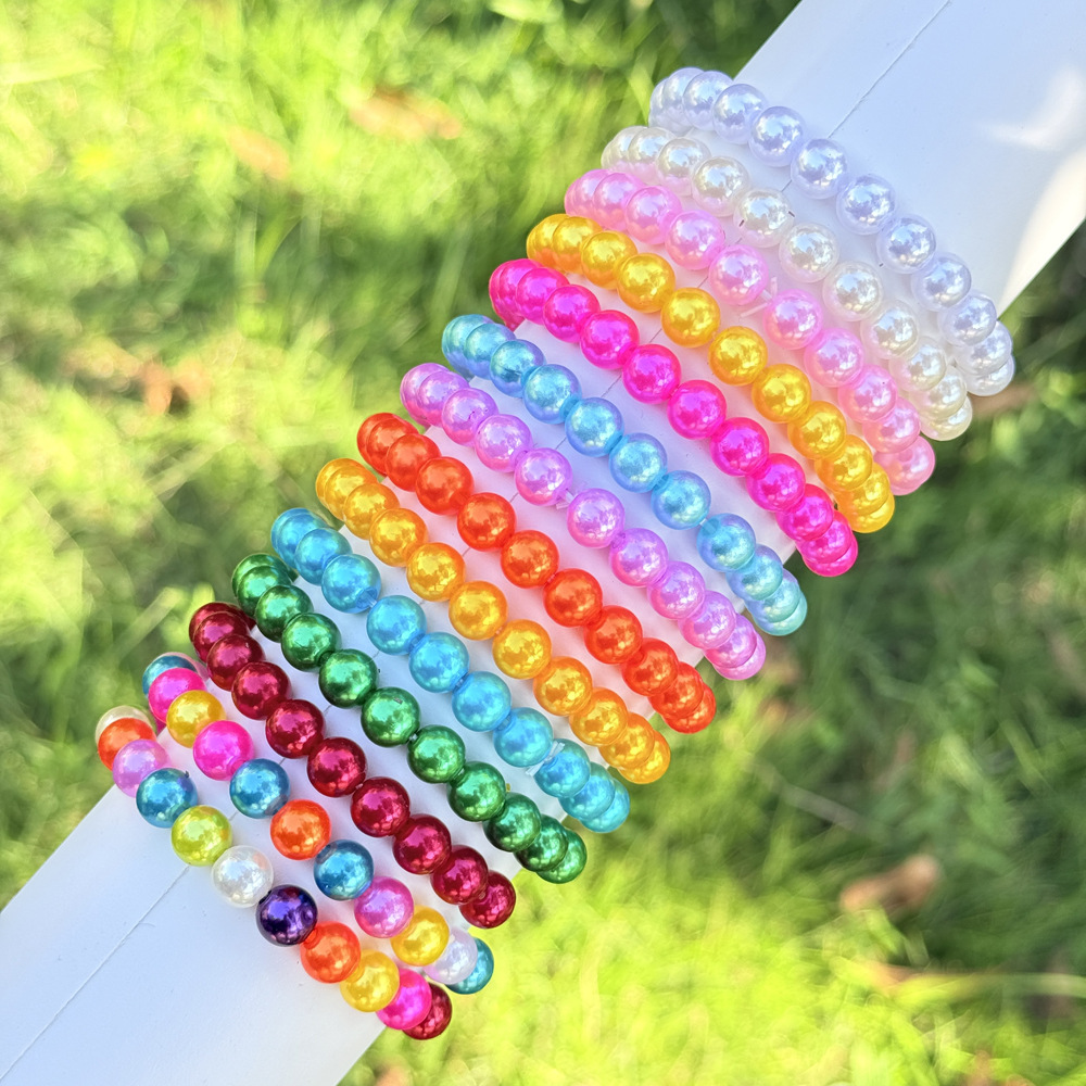 Pulseras infantiles coloridas con cuentas y varios colgantes de dibujos animados, accesorios de alta calidad y exquisitos para niñas, regalos de cumpleaños, productos al por mayor.