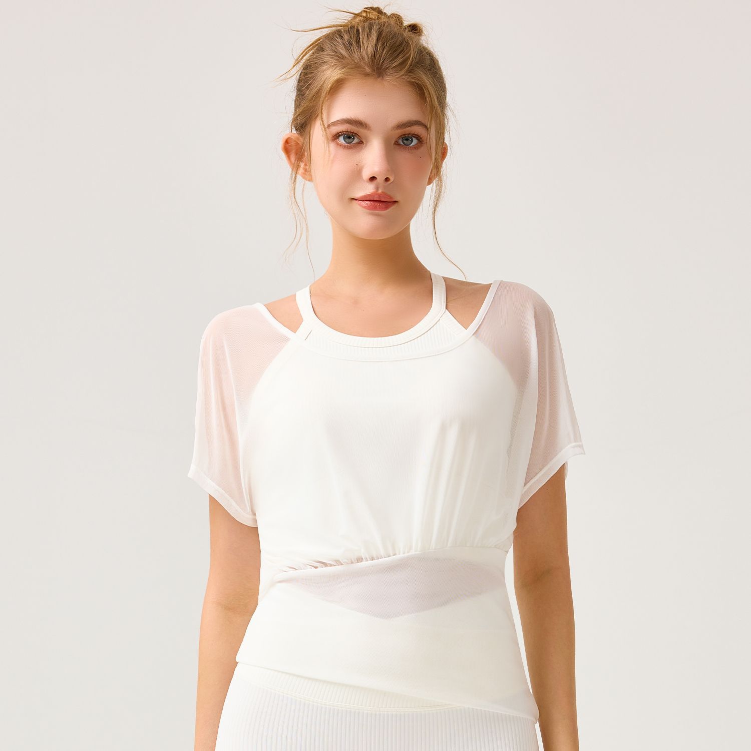 Conjunto deportivo de primavera y verano para mujer, ropa de yoga de alta gama, top de fitness de secado rápido, blusa de malla de manga corta.
