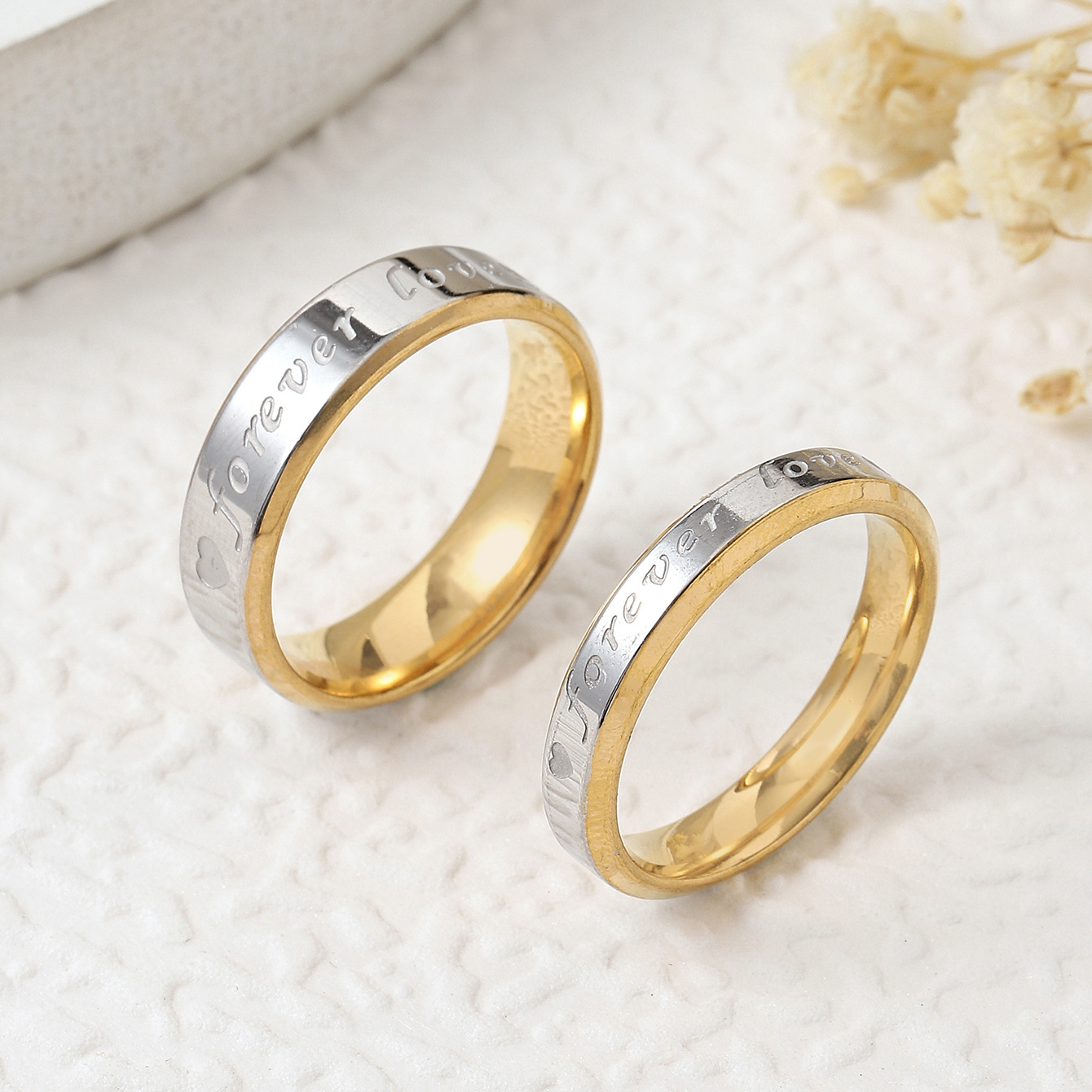 Anillo de acero de titanio transfronterizo femenino Corea del Sur moda para siempre amor pareja anillo corrosión oro joyería de acero inoxidable