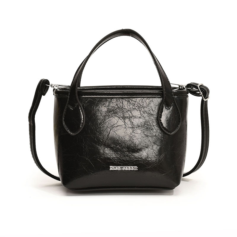 Bolso popular de este año, bolso de moda de mujer de textura alta, bolso de mochila, bolso de cubo portátil, bolso de mujer de verano