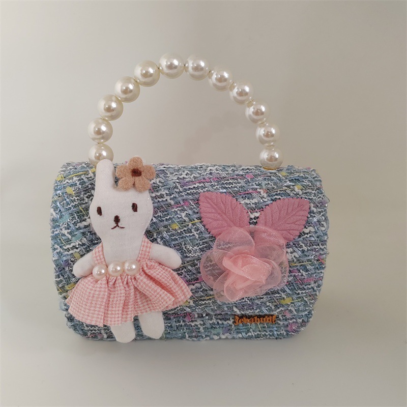2025 primavera y verano estilo caliente moda casual niños dulces bolsa de gelatina mini bolso de mensajero de un solo hombro variedad al por mayor