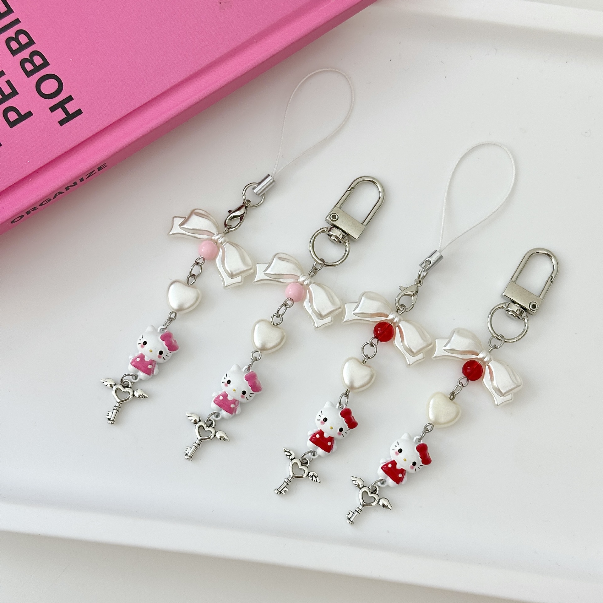 Original Japanese and Korean Ins Cute Cartoon Kitten Keychain Bow Heart Beaded Mobile Phone Chain Backpack Pendant