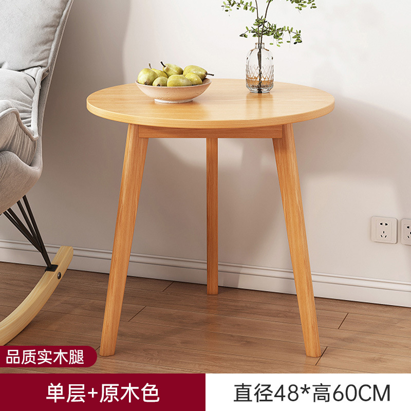 Sofá de la sala de estar pequeña mesa redonda doméstica, estante de cabecera de cama moderno y minimalista, mesa de té creativa con balcón