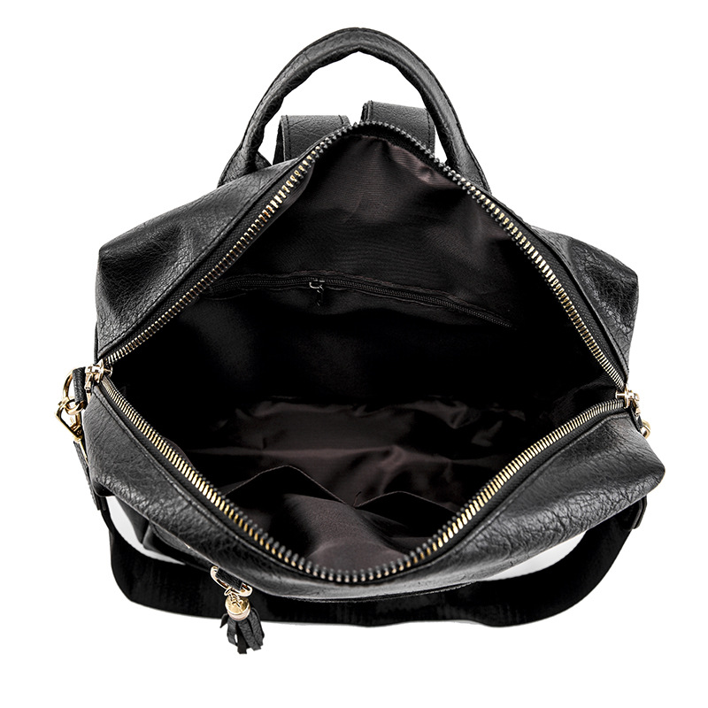 Spot al por mayor 2023 nuevo estilo coreano retro señoras mochila de viaje multifuncional de borla de cuero suave de moda