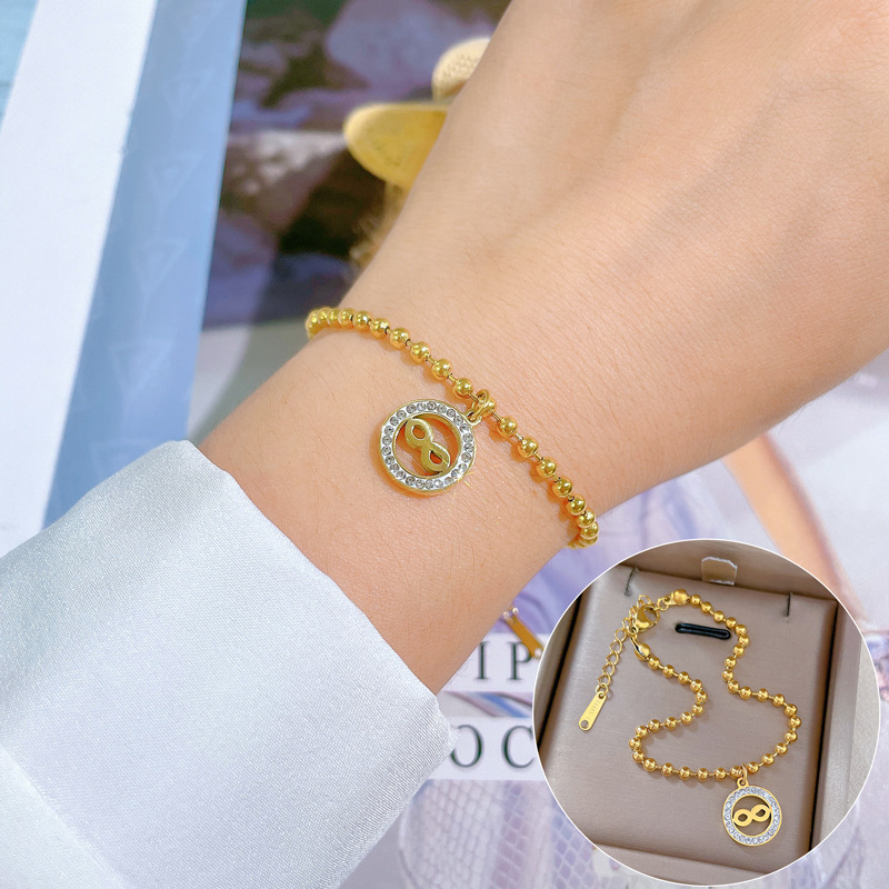 Bracciale donna con perline rotonde personalizzato in acciaio_voghion.com