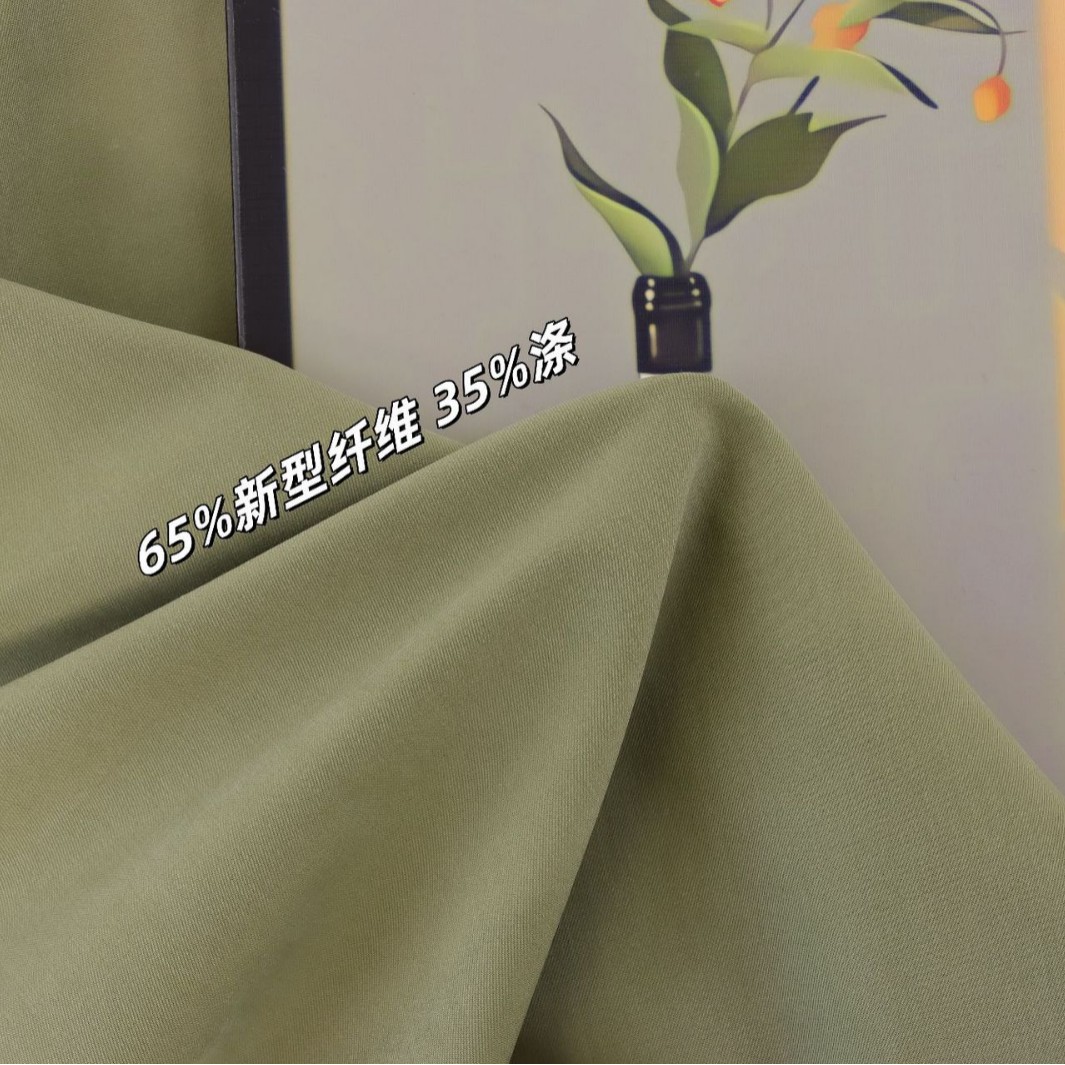 柯桥梭织斜纹新型纤维弹力混纺面料潮款风衣连衣裙休闲裤服装布料