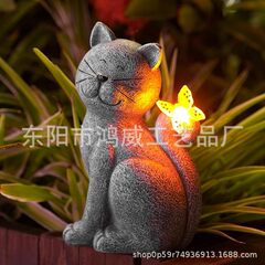 新型国境を越えた25cmの超巨大猫蝶像が太陽エネルギーled発光屋外庭園を飾っている