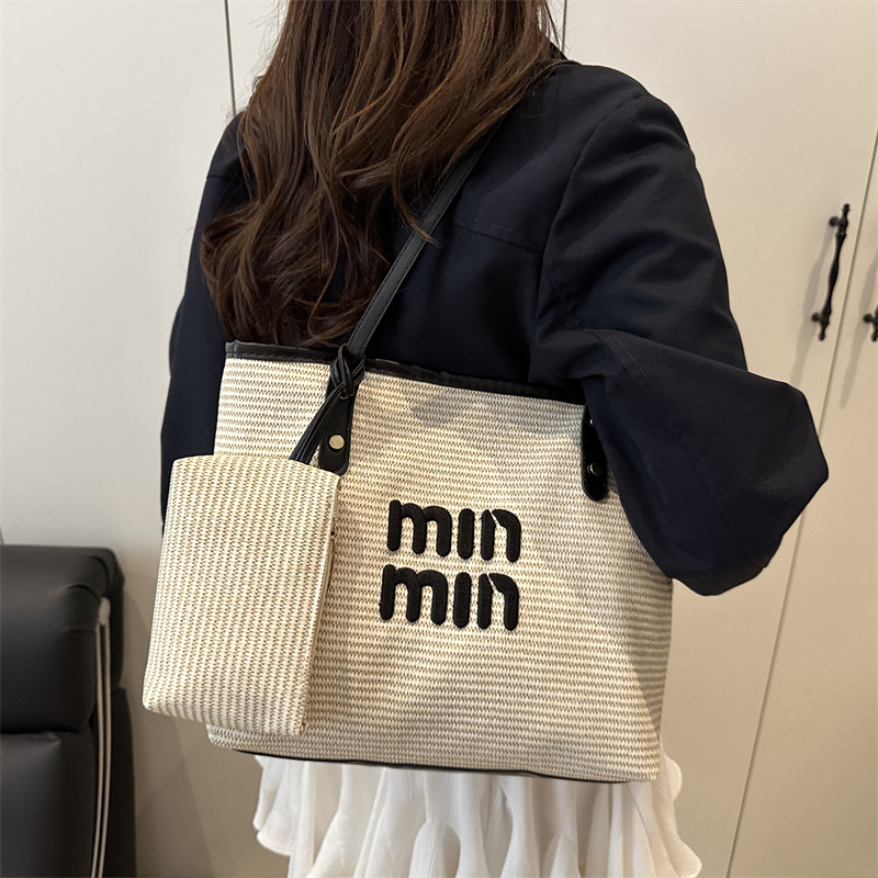 2025 nuevo este año popular bolso de mujer gran capacidad bolso de hombro universal bolso de clase de estudiantes universitarios