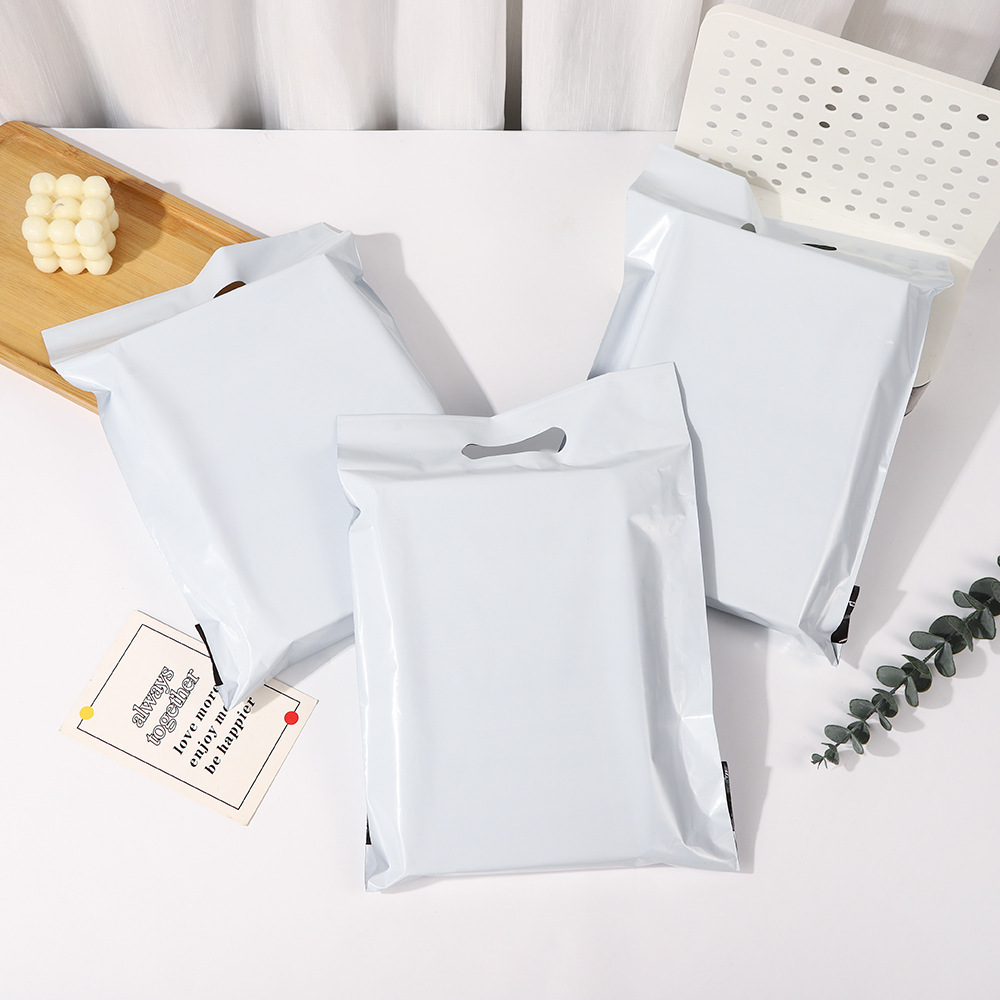 Bolsa de entrega rosa portátil, bolsa de embalaje de color de ropa PE gruesa, bolsa de transporte ecológico de gran capacidad, bolsa impermeable
