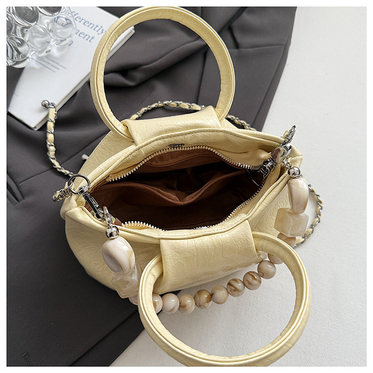 A stylish and trendy beaded bag for women, a new summer chain crossbody cloud bag for women in 2025 undefined