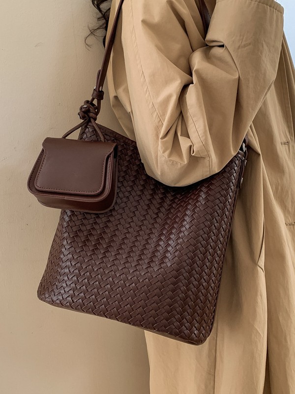 Diseño coreano de nicho de tejido bolso de cubo de agua de mujer nueva textura de alta calidad de hombro versátil bolso de tramo inclinado