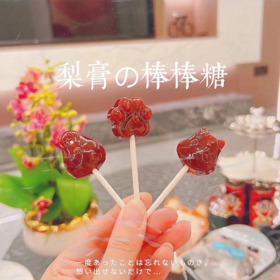秋梨膏棒棒糖硬糖儿童小零食袋装卡通造型圣诞袜秋梨膏棒棒糖批发
