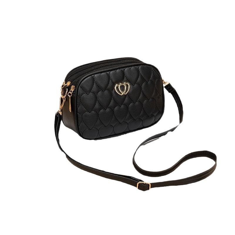 Gran capacidad de tres cremallera mochila 2024 nueva moda simple en forma de V diamante corazón bordado monocromático bolsa de cámara