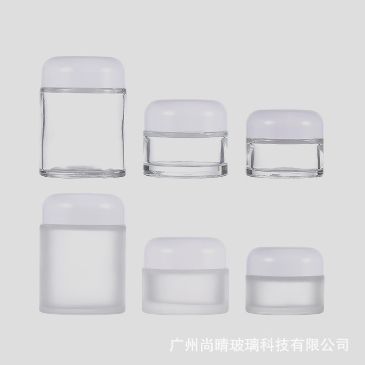 Ventas directas de fábrica 15-100g botella de ungüento de boca ancha transparente cúpula botella de crema cosmética botella de crema de vidrio 50g