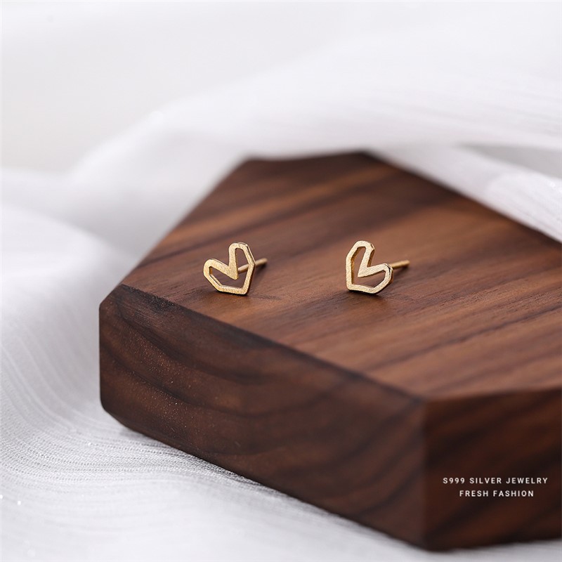 S999 a forma di cuore geometrico cavo per donna, semplice temperamento spazzolato fatto a mano, argento versatile e orecchini_voghion.com