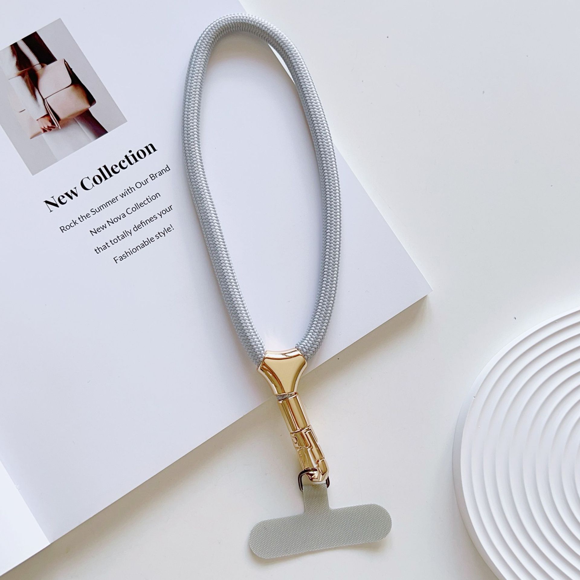 Cuerdas de muñeca ajustables de alta calidad con clips de hebilla pequeñas y frescas de poliéster corto para colgar teléfonos móviles simples y versátiles