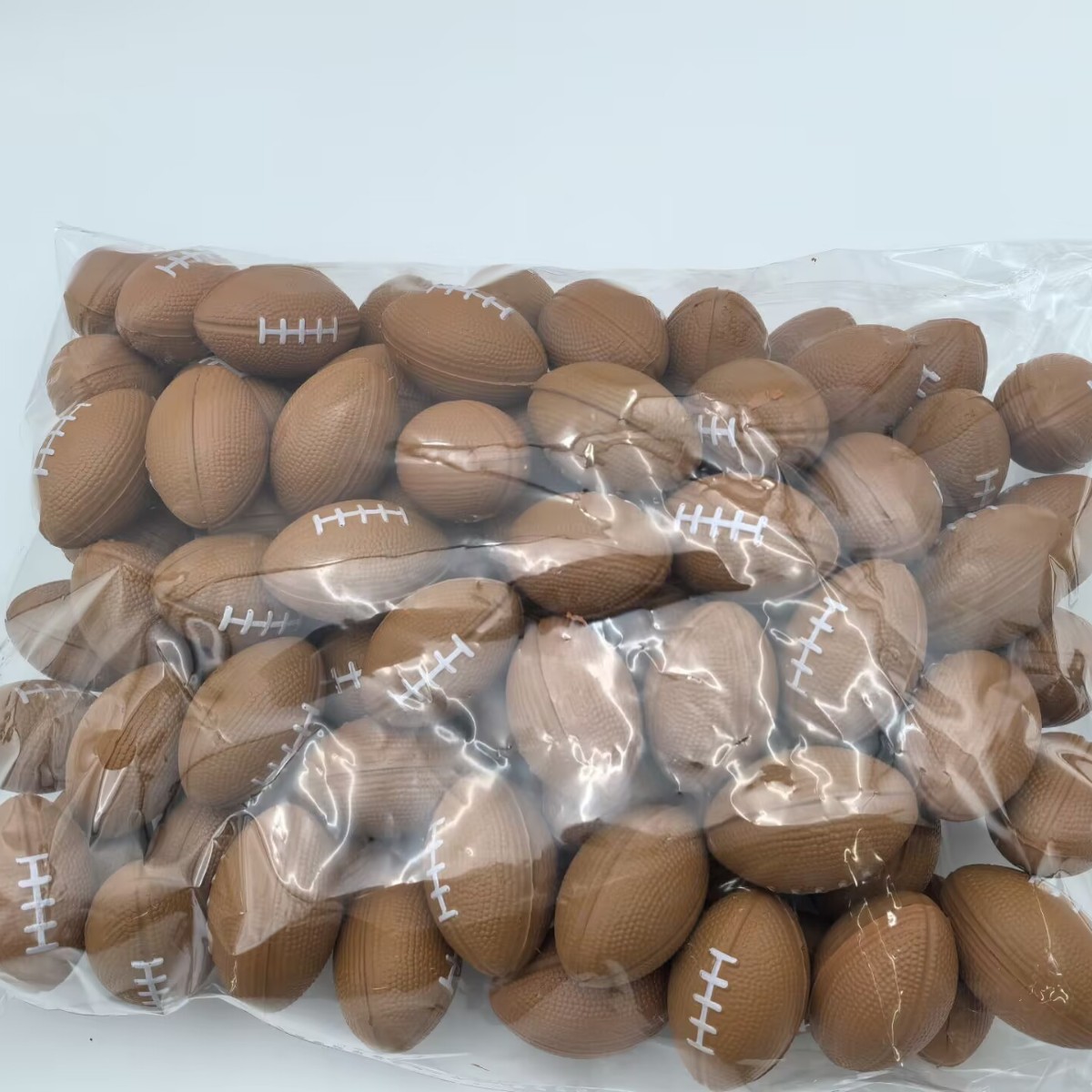 Amazon Cross Border Mini 3cm Rugby Kindergarten Sponge Solid Decompression Bounty Ball Pressure Rugby