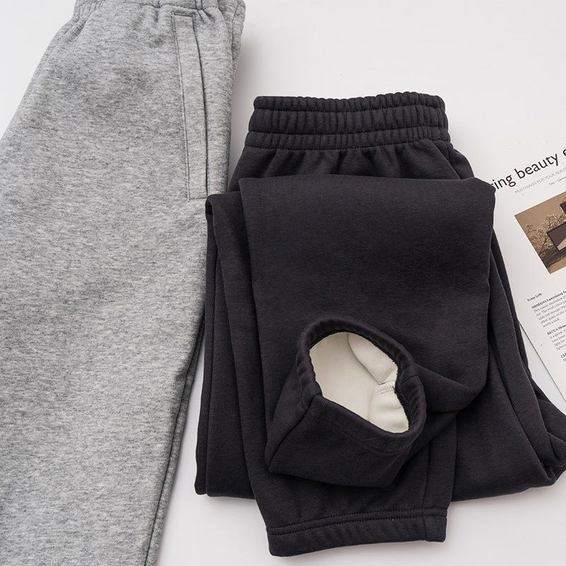 Nueva cremallera bolsa de lana forrado pantalones de chándal de los hombres y las mujeres otoño y el invierno suelto nuevo tobillo-atado de algodón casual espesado caliente pantalones hombres