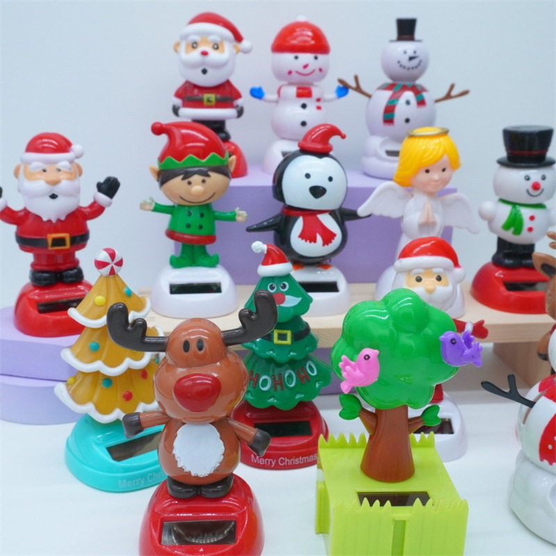 Cross-border Christmas solar energy automatic swing doll car interior shake head decorations creative car car ornaments