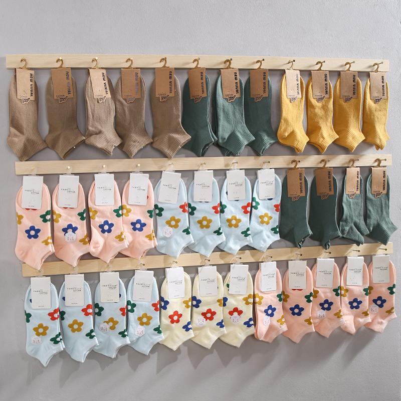 Sock rack, wooden display shelf, wall-mounted hanging rack, children's clothing store, shop display booth, adult showcase, wholesale