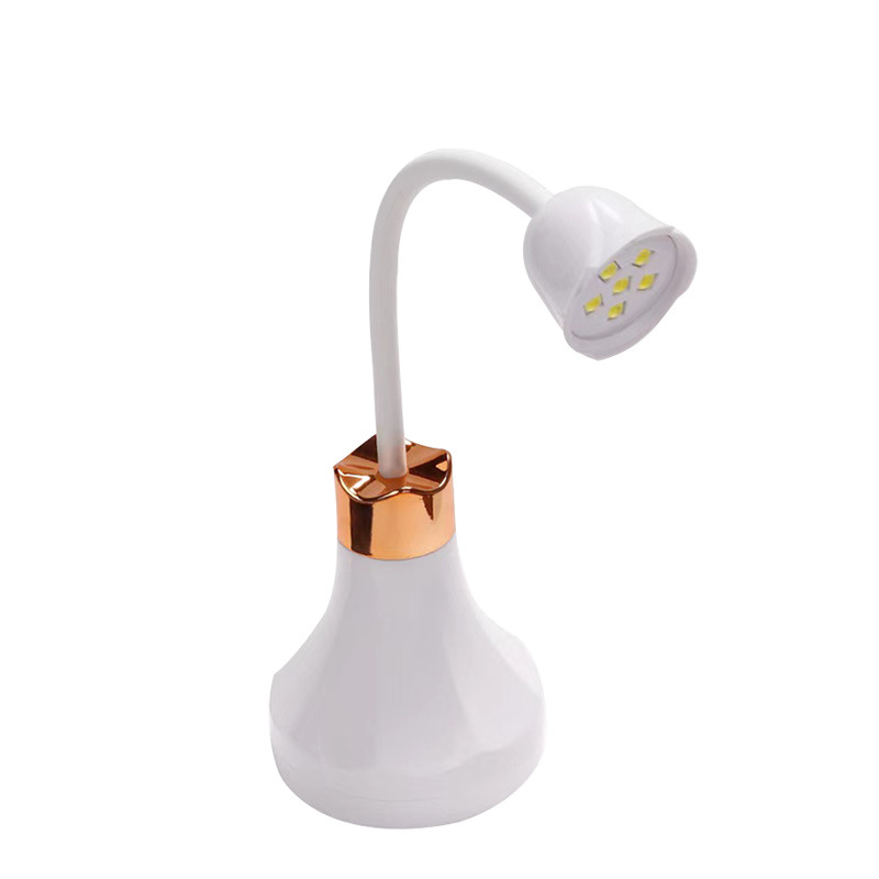 Lámpara de uñas de celebridades de Internet Lámpara de loto de escritorio pequeña Tienda de uñas Lámpara para hornear de esmalte de uñas Lámpara recargable Lámpara de terapia de luz para el hogar al por mayor