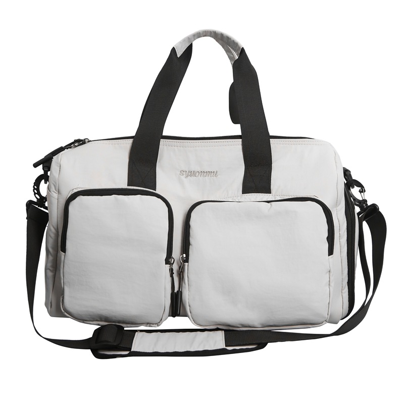 Bolsa deportiva de acondicionamiento físico de gran capacidad para mujeres bolsas de viaje corto bolsas de mano 2025 nuevas bolsas domésticas almacenables