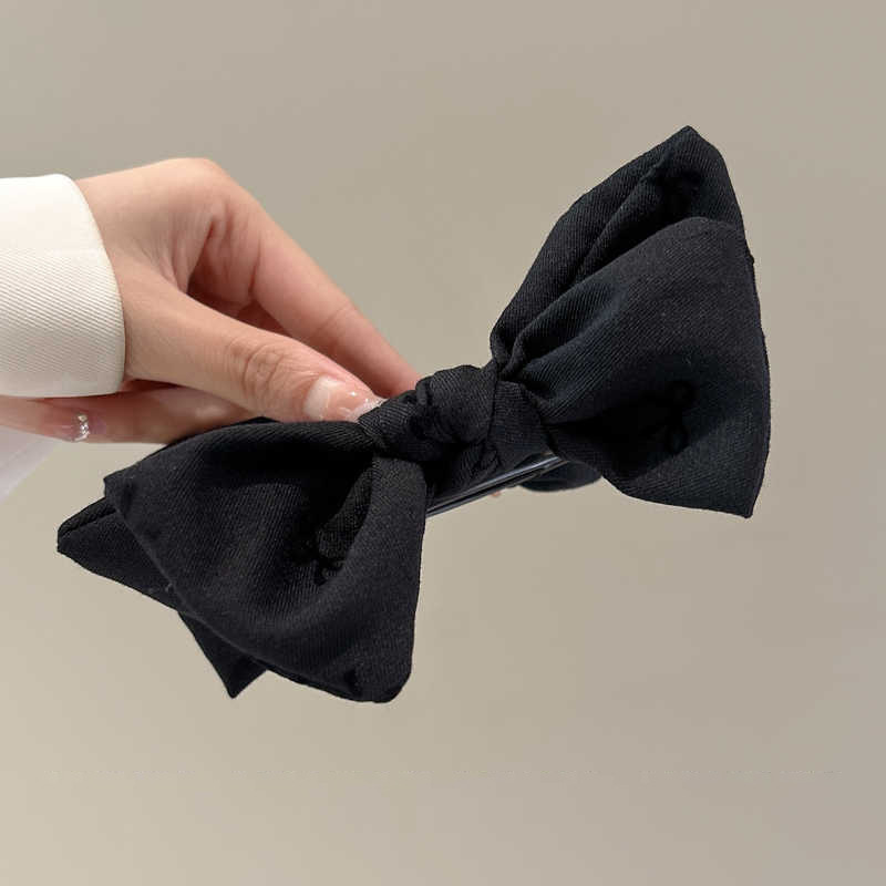 Bow Ball clip para el cabello de mujer alta sensación de disco de cabello alto clip de agarre de cola de caballo 2024 nuevo diseño elegante tocado