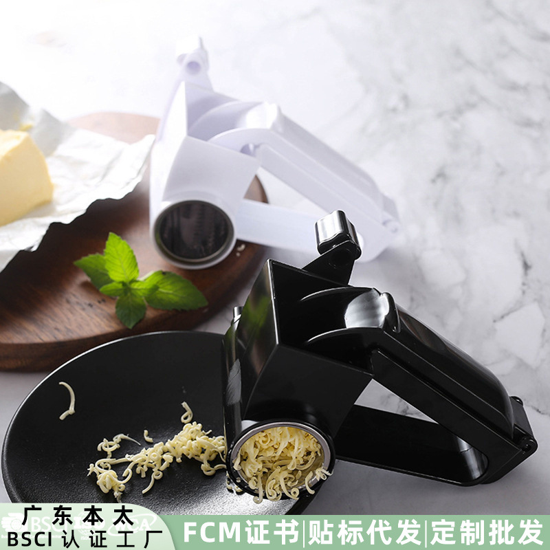 Rallador de queso giratorio de arranque manual en caja de color tres en uno rallador de queso multiuso transfronterizo