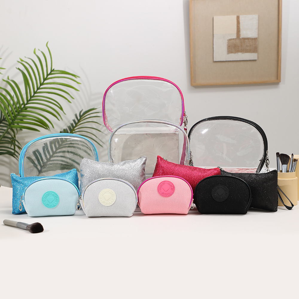 Nueva bolsa de maquillaje material de PVC transparente bolsa de almacenamiento visual tres piezas portátil simple bolsa de lavado al por mayor