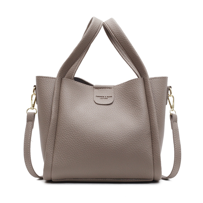 Comercio exterior ocio retro bolso de cubo de mano 2025 nuevo versátil simple bolso de hombro de alta calidad textura mochila