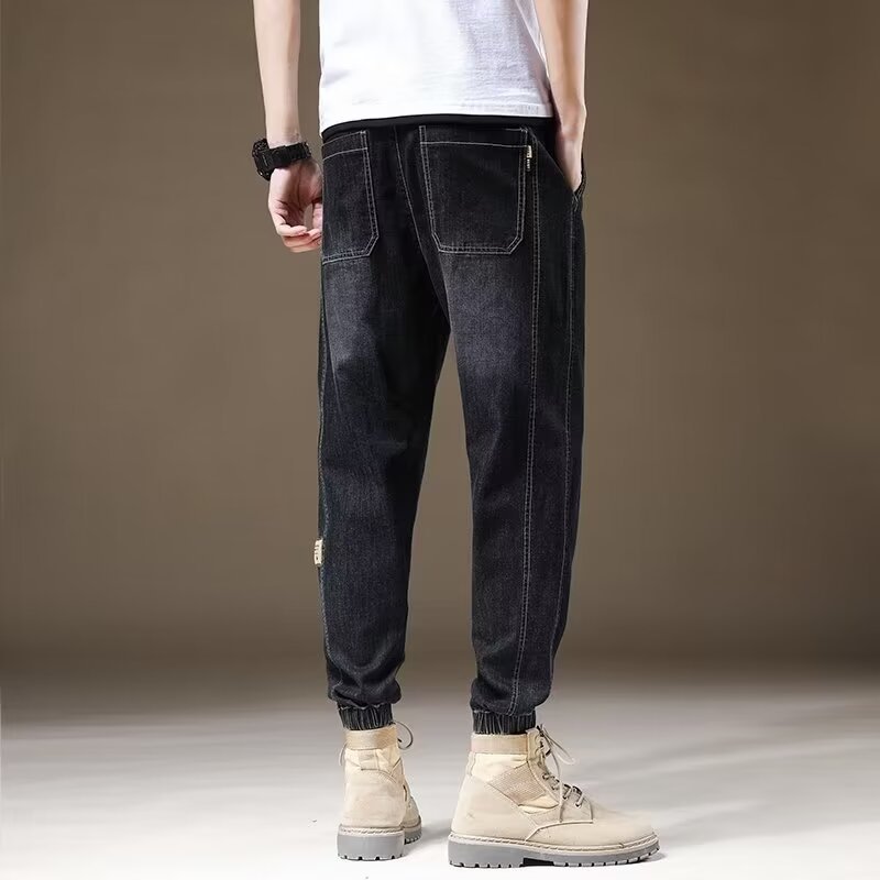 2024 primavera y otoño pantalones vaqueros de cintura elástica todo fósforo para hombres, pantalones de pierna ancha rectos sueltos para adolescentes de la calle principal