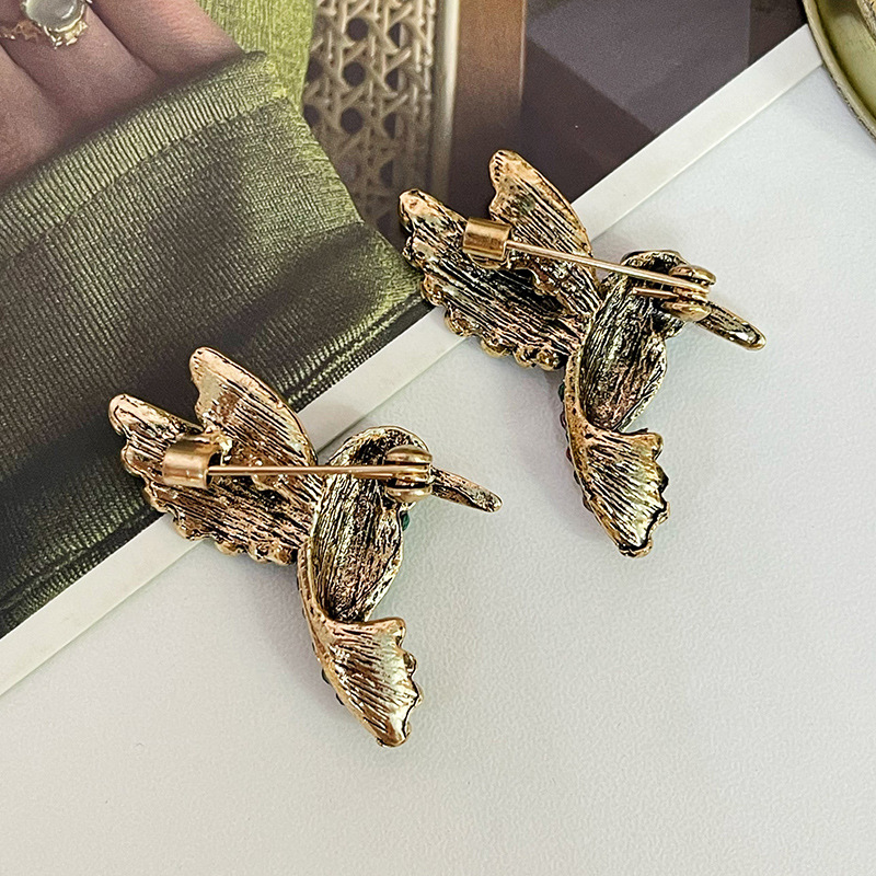 Spilla a forma di uccello con strass accessorio elegante animale_voghion.com
