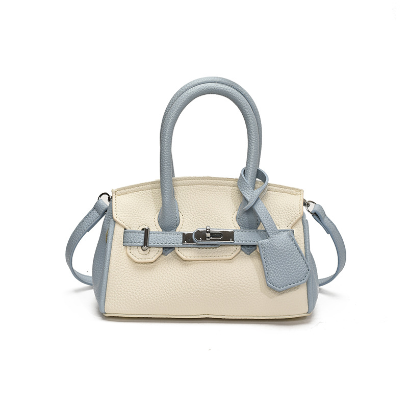 Bolso portátil de platino con textura de moda transfronteriza, bolso de hombro simple y versátil de lujo ligero, bolso de nicho de temperamento de gran capacidad