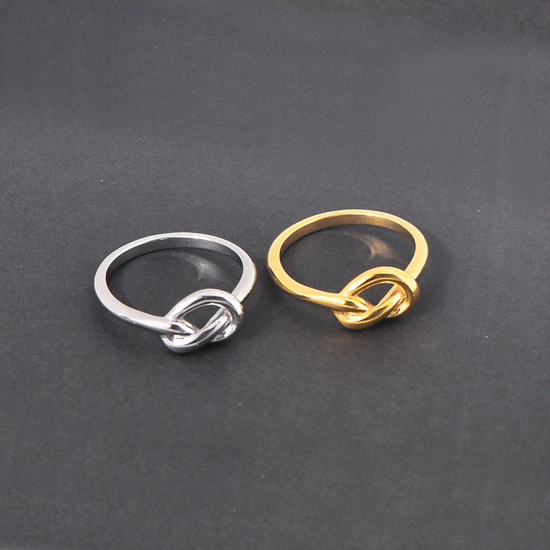 Cross-border Amazon ebay knotted heart knot titanium steel trendy men and women neutral tail ring ring engagement seeking wedding ring wholesale