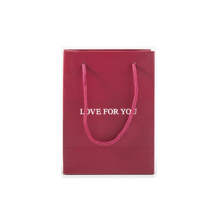 Bolso de joyería bolsa de embalaje bolsa de papel bolsa de regalo se puede imprimir logotipo en stock al por mayor diseño libre