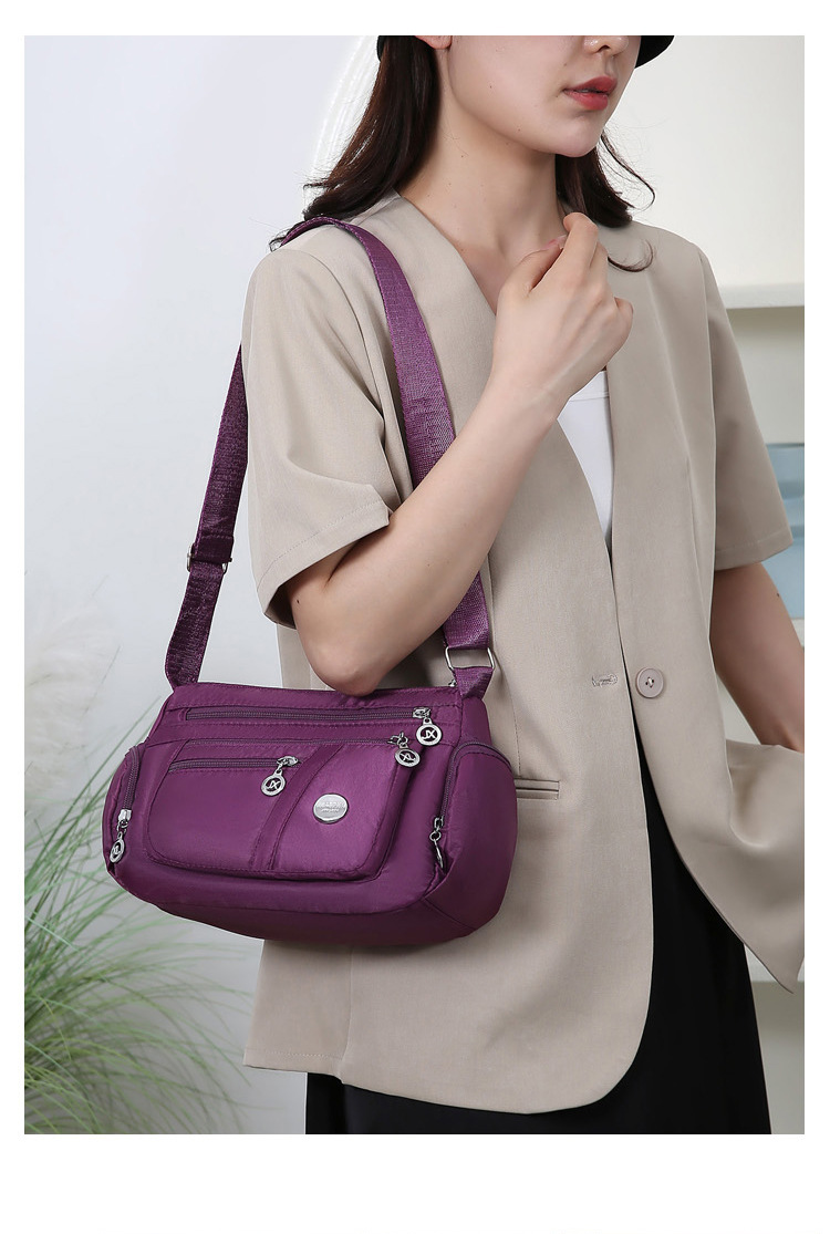 A new popular women's crossbody bag with multiple layers made of Oxford fabric, fashionable, casual and trendy. It's a single-shoulder bag for middle-aged and elderly mothers undefined