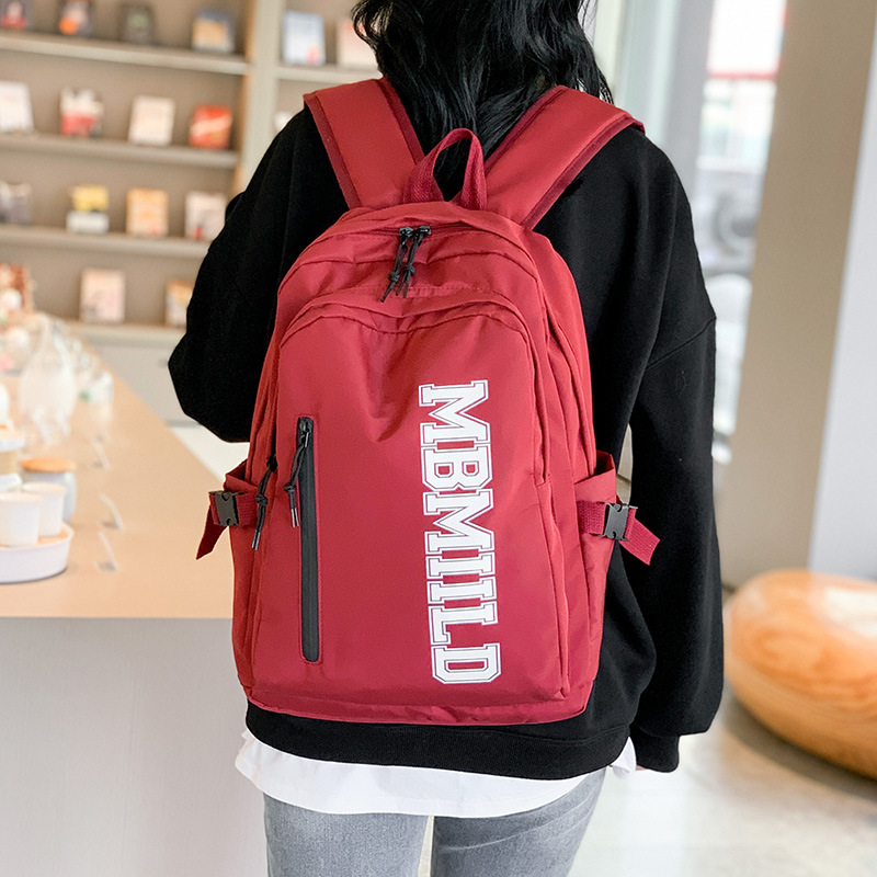 2024 nueva mochila japonesa simple de moda mochila de estudiantes de escuela secundaria gran capacidad mochila de viaje a prueba de rociadores