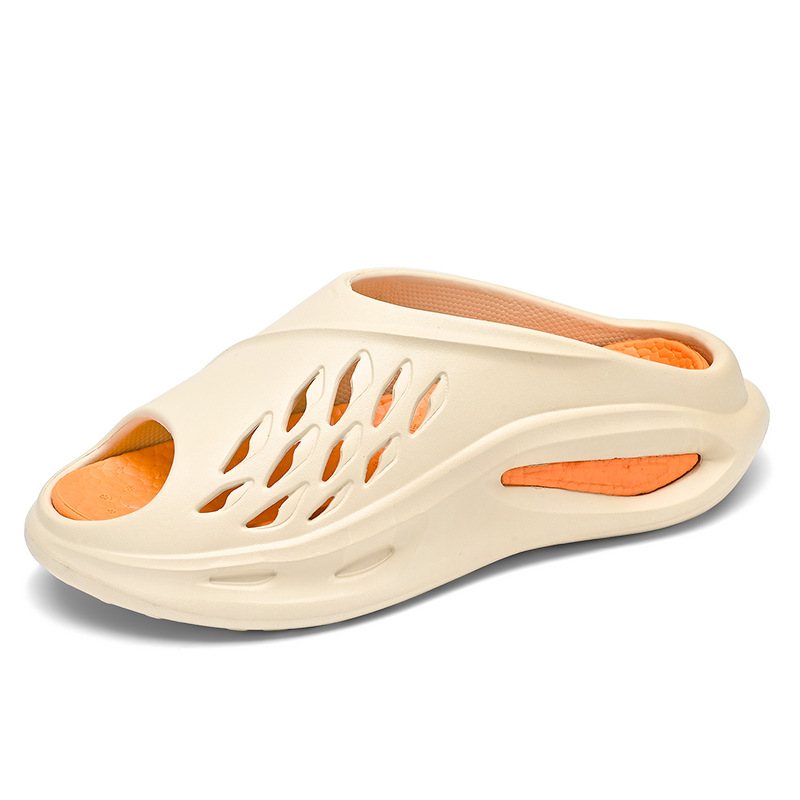2025 verano nuevo coco Baotou Hole zapatos de tamaño grande playa de tamaño grande comercio exterior Eva pareja sandalias mayorista