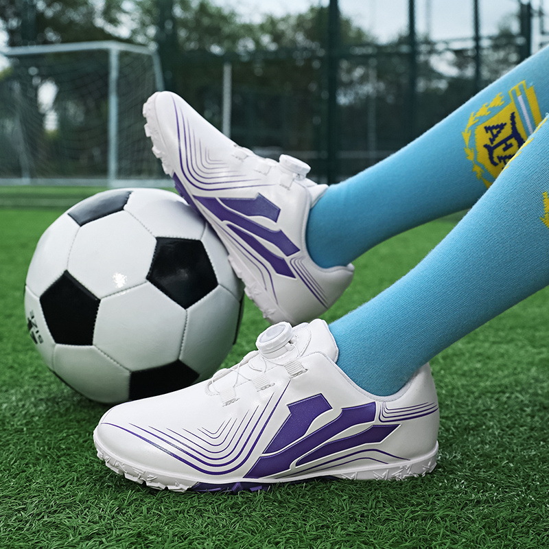Baochuan nuevo zapato de fútbol transpirable para niños botón giratorio para niños TF clavos rotos zapatos de entrenamiento de fútbol transfronterizos