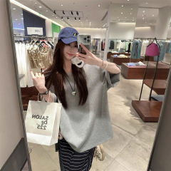 韓系デザイン感空気感大郭形tシャツの後に細く透かし彫りのゆったりした上着の半身スカートの2点セット