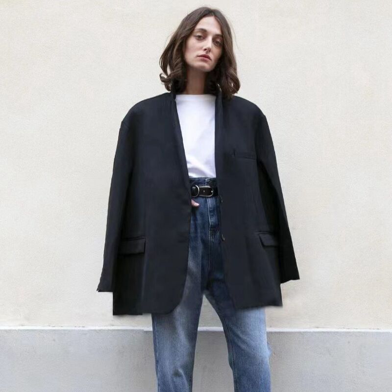 American retro commuter boyfriend style profile loose mid-length black suit jacket